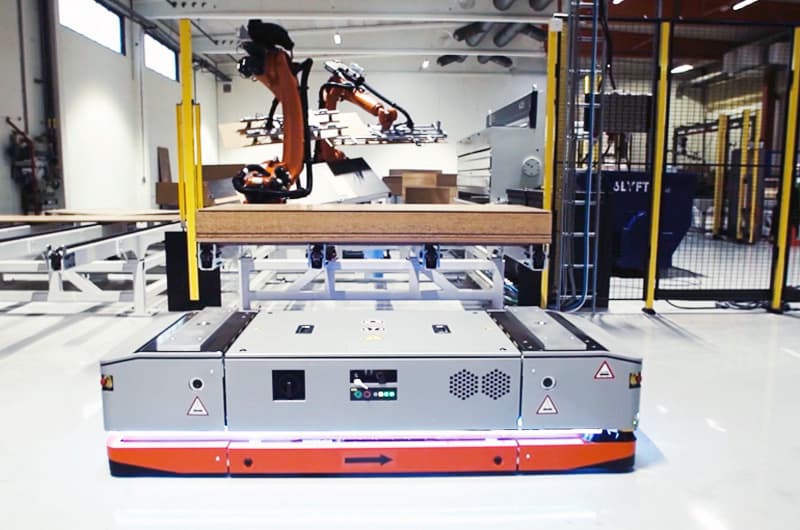 Automated guided vehicle (AMR) in industrial warehouse