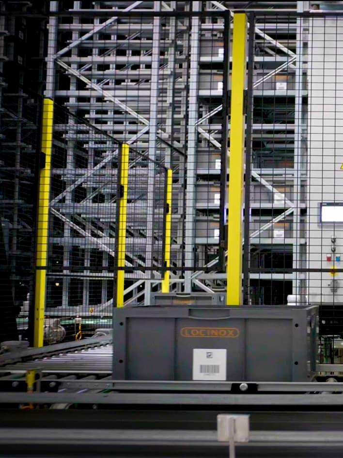 Conveyor system with safety fencing, designed to restrict access to hazardous automated areas