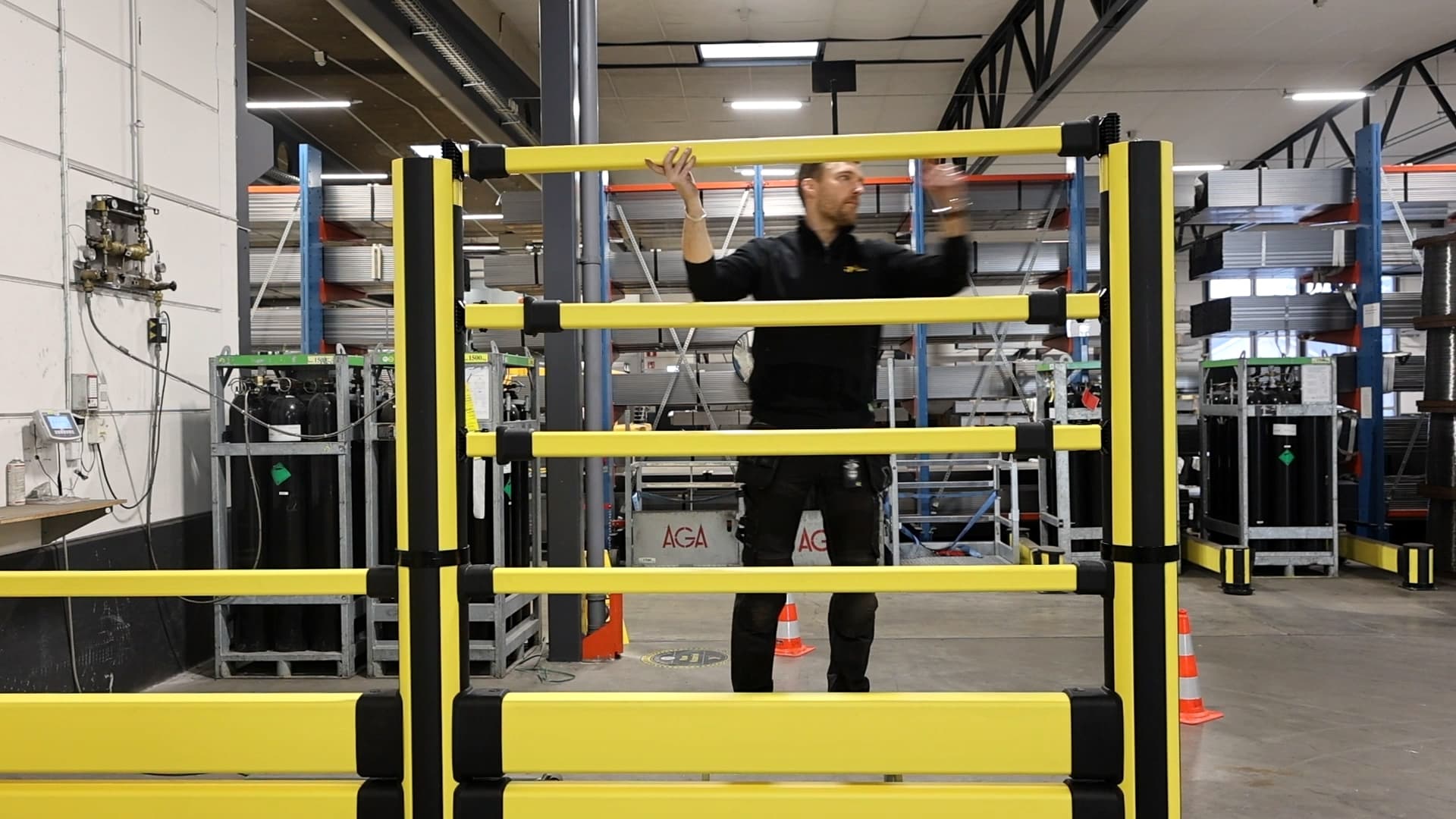 Worker assembling Toppe Barrier