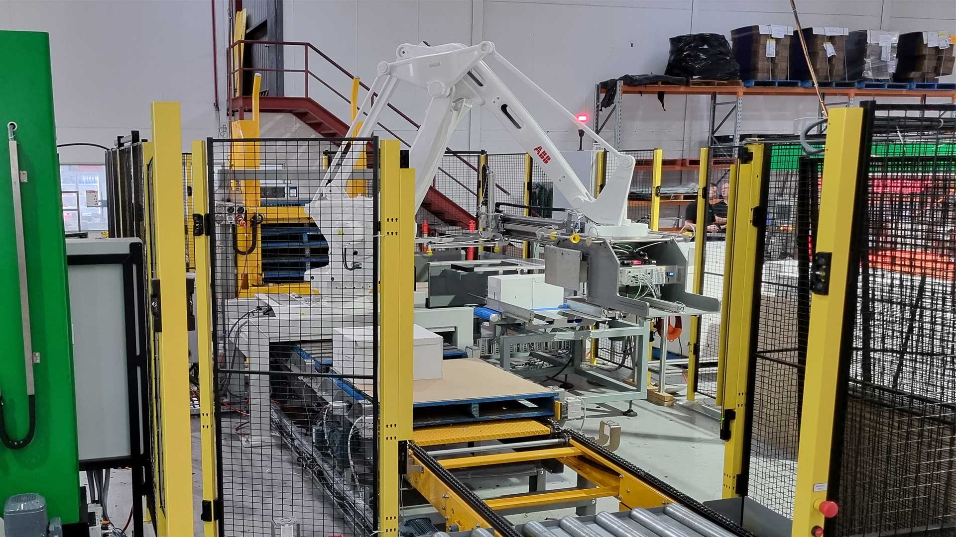 Robotic palletizer with machine guarding for operator safety