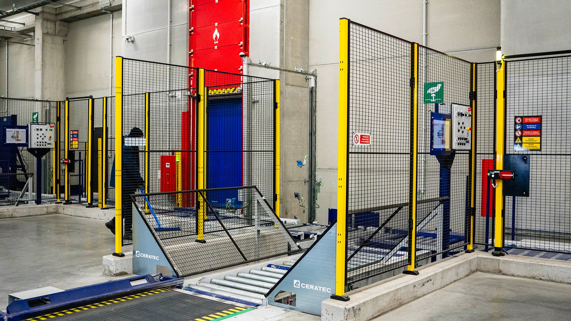 Industrial workspace enclosed by safety fencing