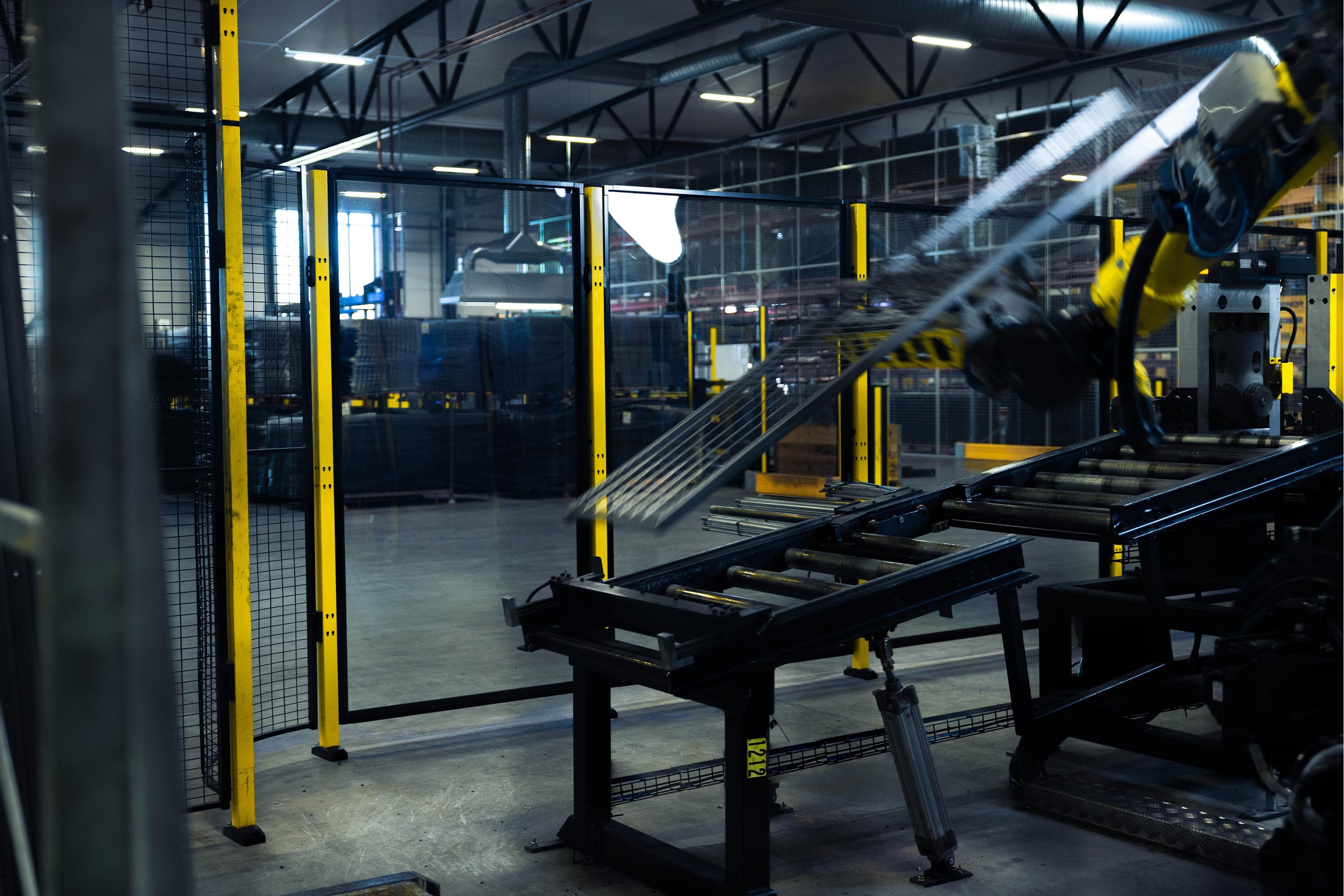 Plastic panel machine guarding protecting a moving machine
