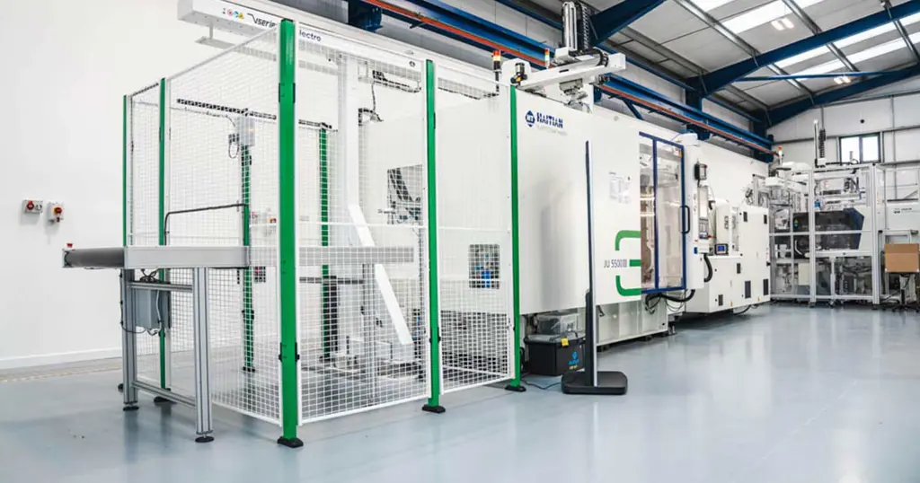 Plastic panels safeguarding a robot and conveyor system