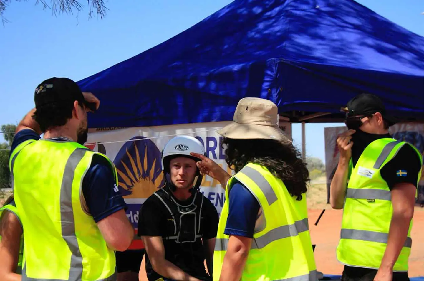 Member of JU Solar Team at a control stop